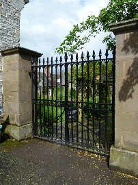 The gates at the entrance to Trinity Hospital in Clun. 